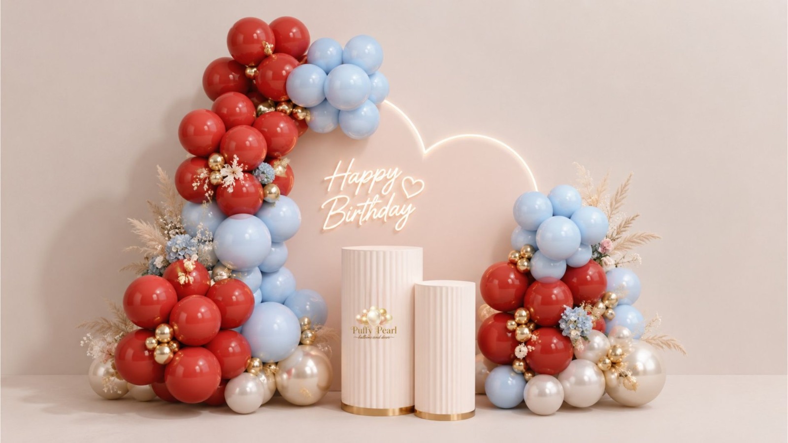 15 ft balloon garland over two metal arch backdrops with pedestals and neon sign